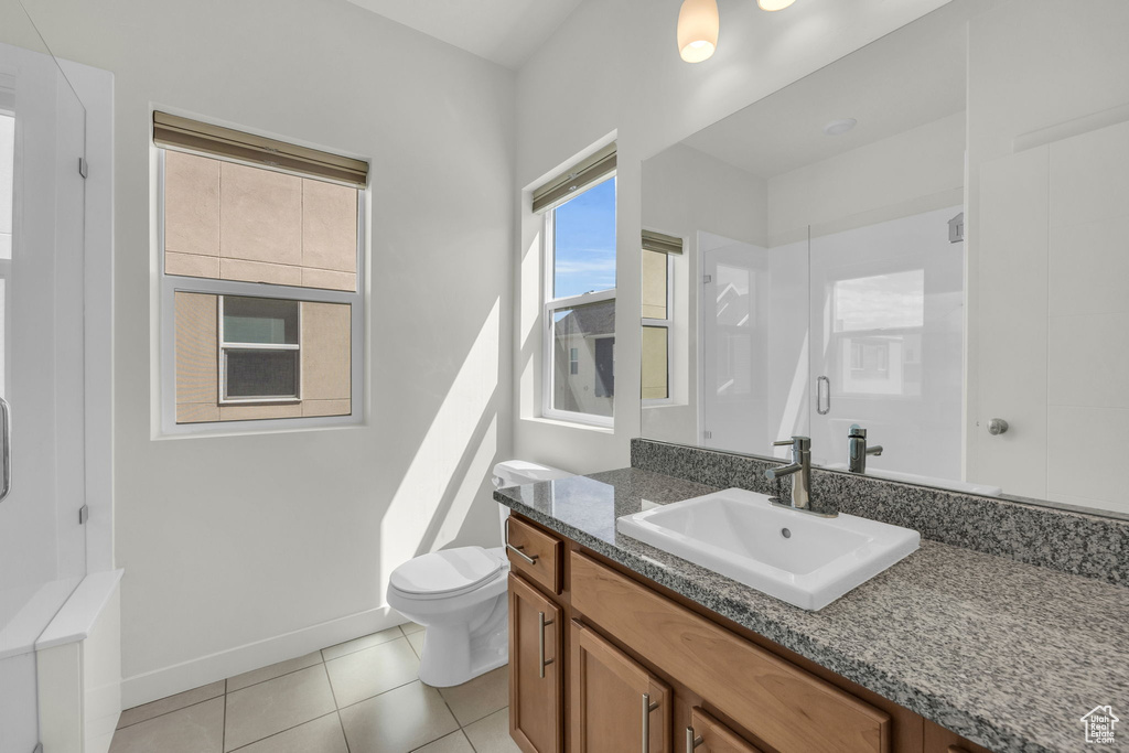 Bathroom with vanity and tile patterned floors