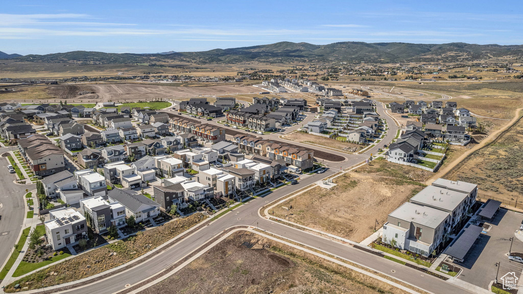 View of property location with nearby suburban area and a mountainous background