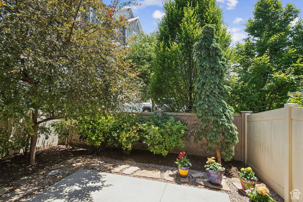 Fenced backyard featuring a patio area