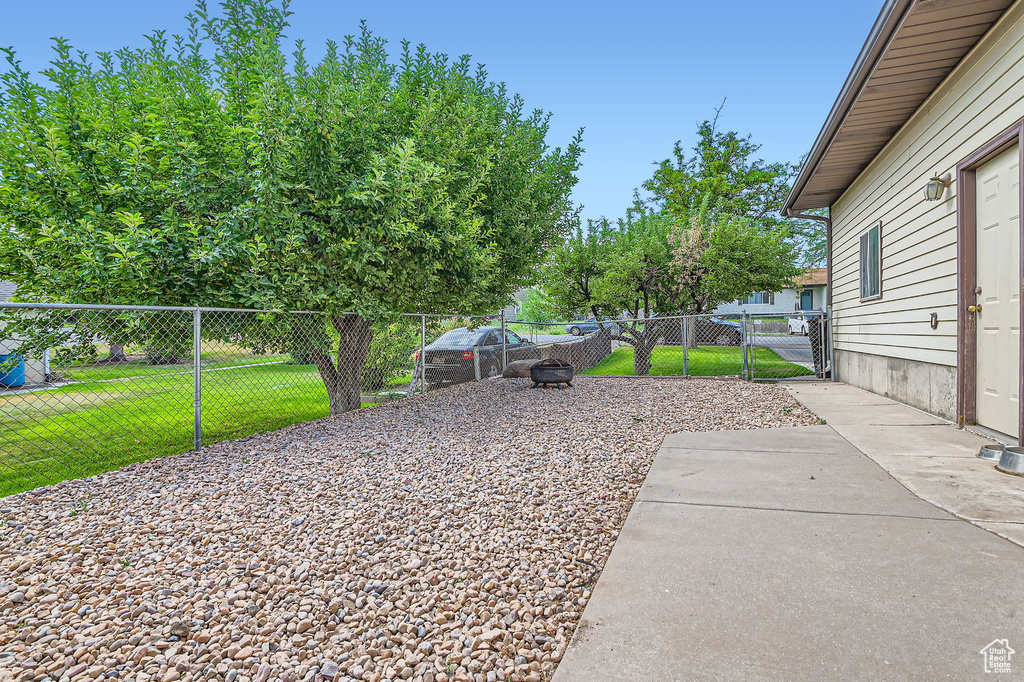 View of yard featuring a gate