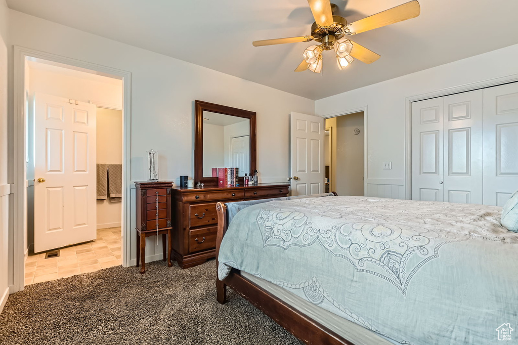 Bedroom featuring a closet and a ceiling fan