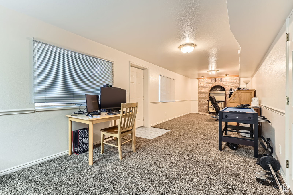 Office area with carpet floors and baseboards