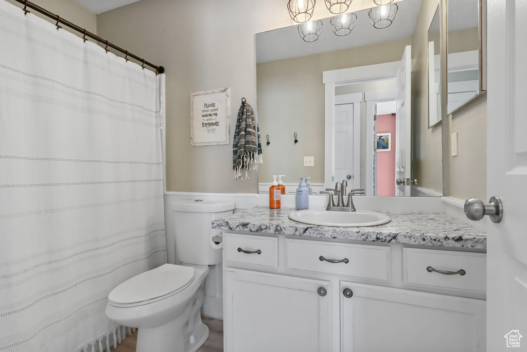 Bathroom with vanity and a shower with curtain