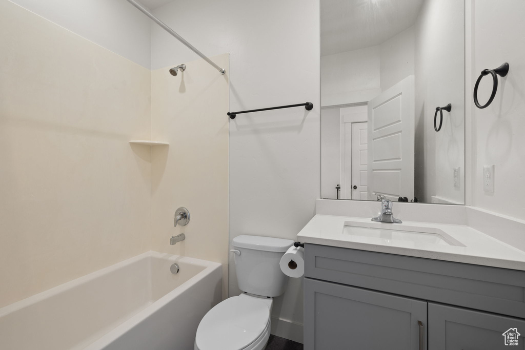 Bathroom featuring vanity and shower / washtub combination