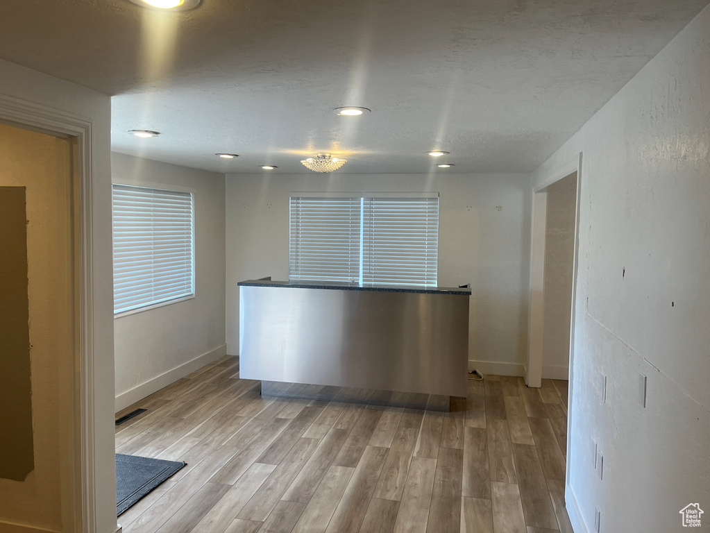 Kitchen featuring light wood-style flooring