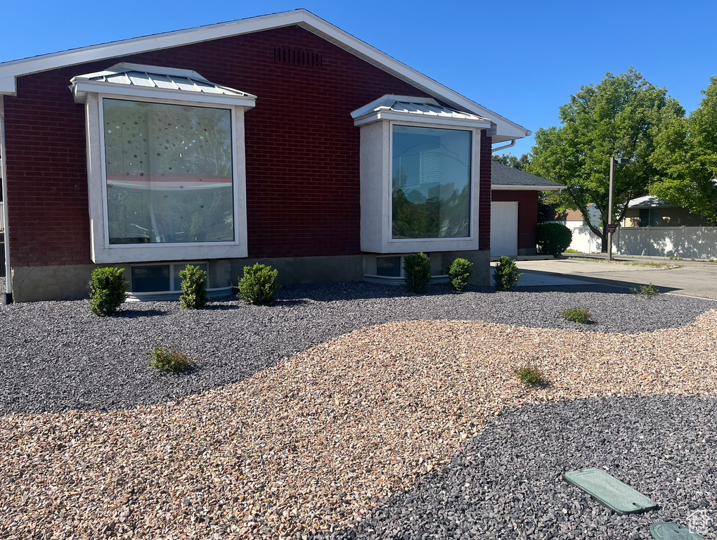 View of home's exterior with brick siding