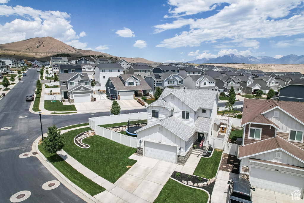 Aerial perspective of suburban area with mountains