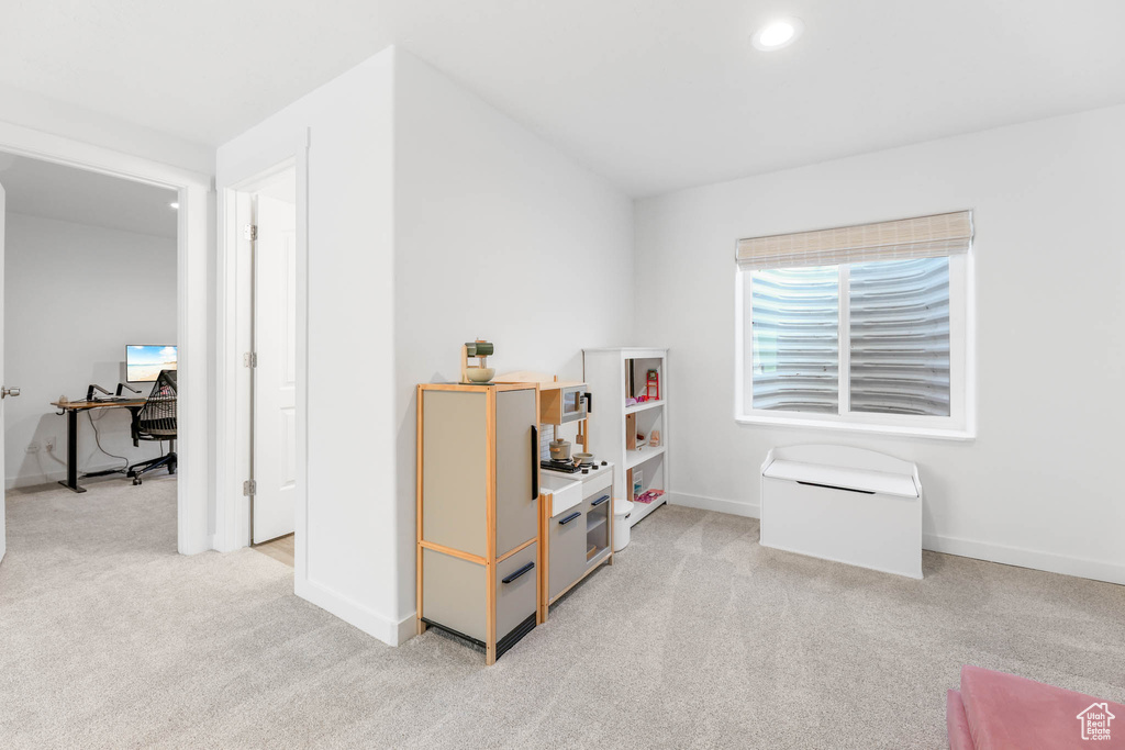 Game room with light colored carpet, an office area, and recessed lighting
