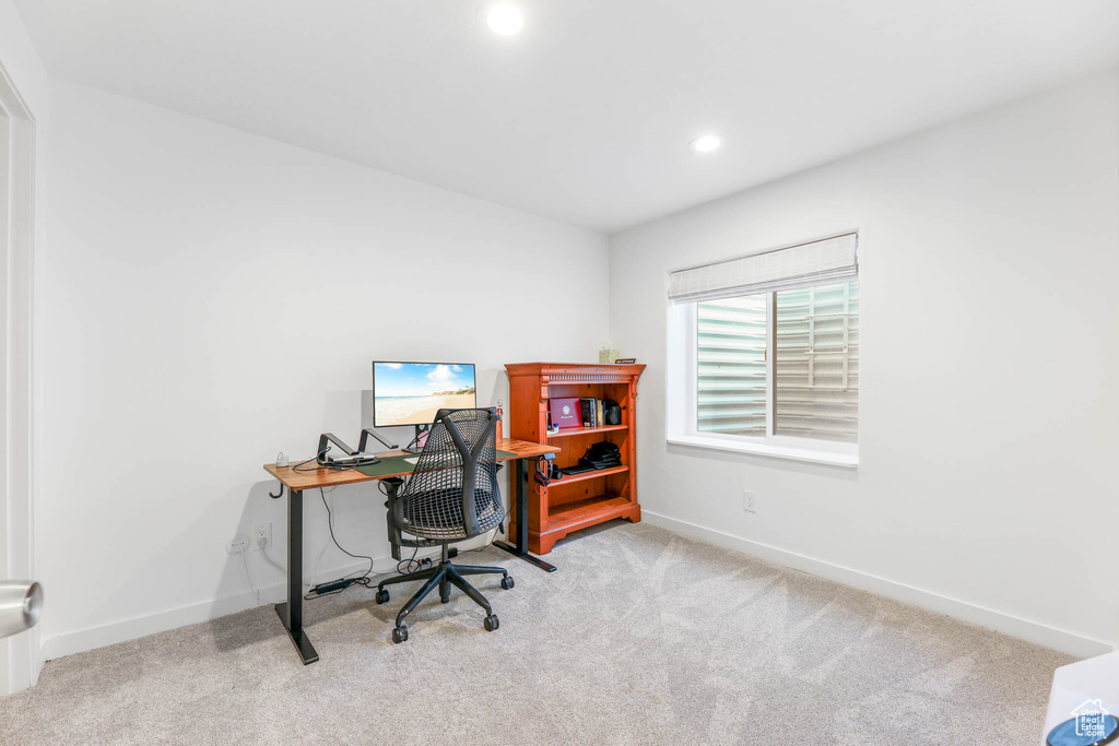 Home office with carpet flooring and recessed lighting