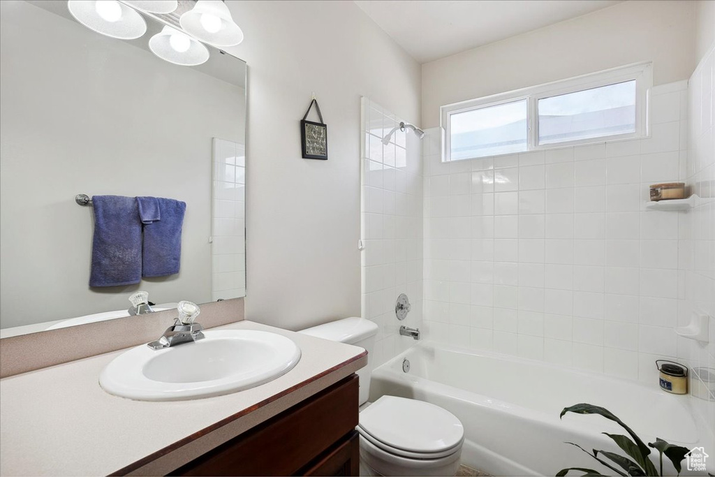 Bathroom featuring vanity and tub / shower combination
