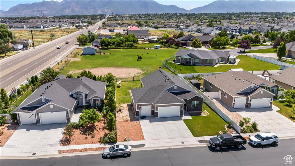 Aerial perspective of suburban area featuring mountains