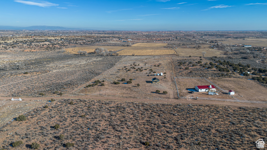 View of rural area featuring mountains and a desert landscape