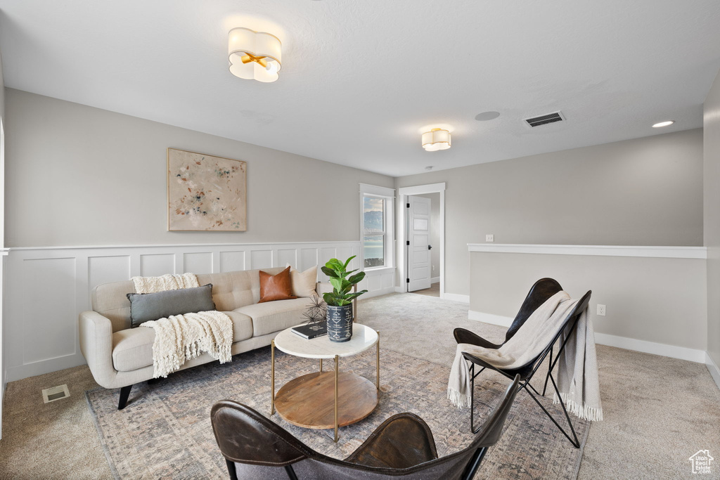 Living area with carpet floors