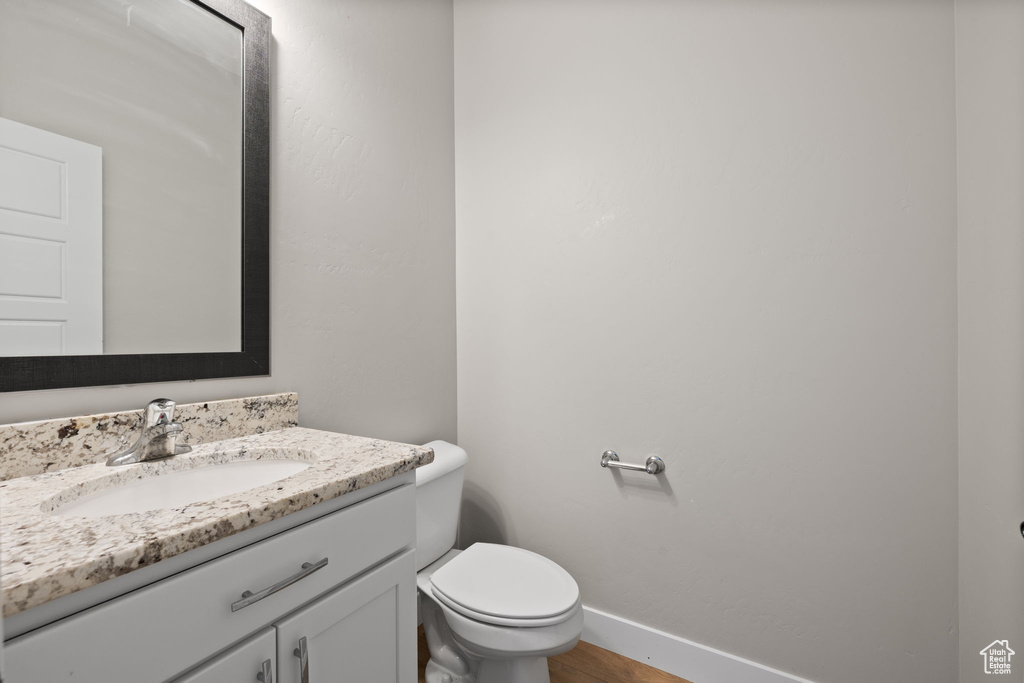 Bathroom with vanity and toilet