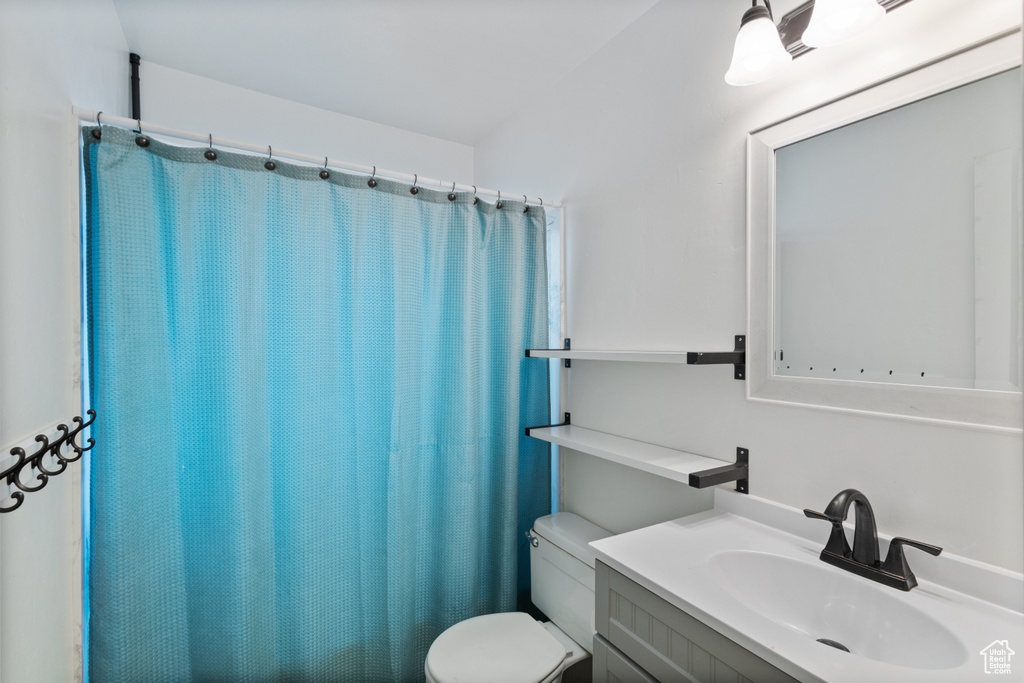 Bathroom with vanity and a shower with curtain