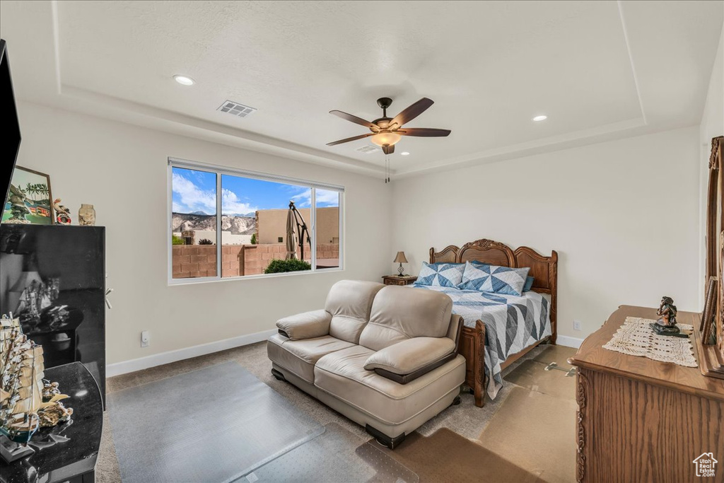 Bedroom featuring recessed lighting, a ceiling fan, and light carpet
