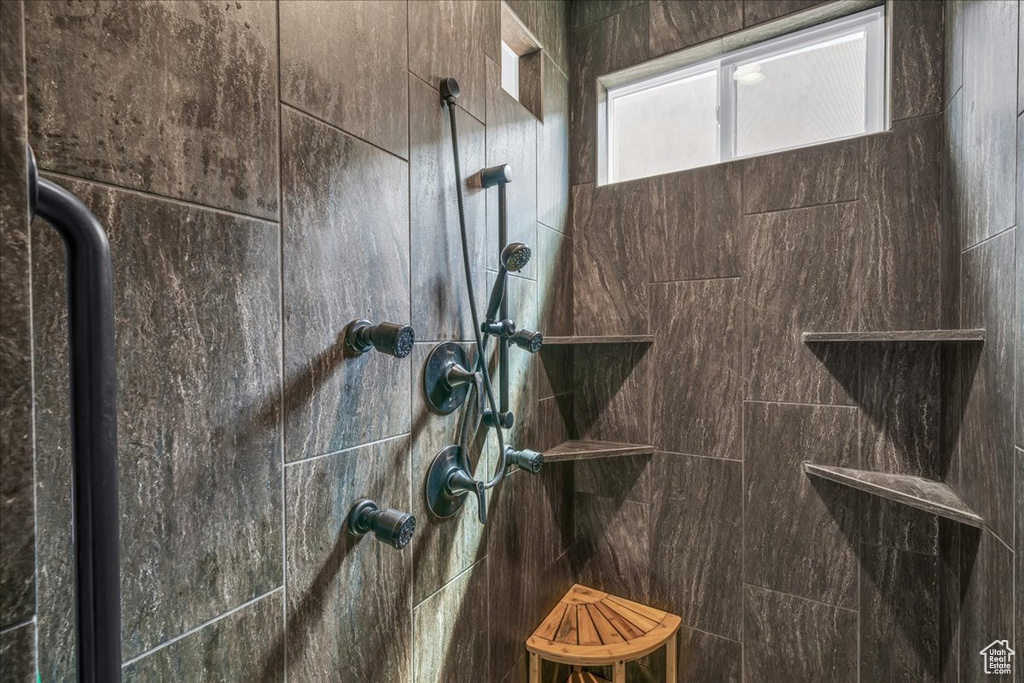Bathroom view of a tile shower
