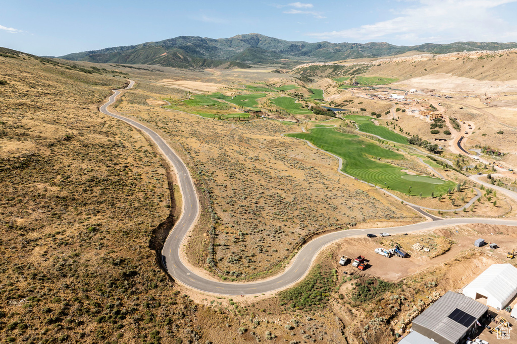 Aerial overview of property's location with a mountain backdrop