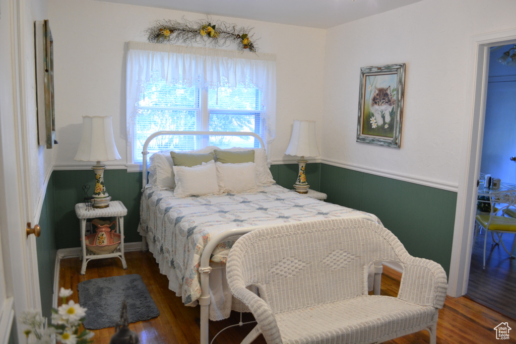 Bedroom featuring wood finished floors