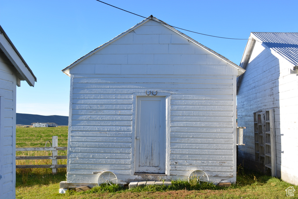 View of shed with a mountain view