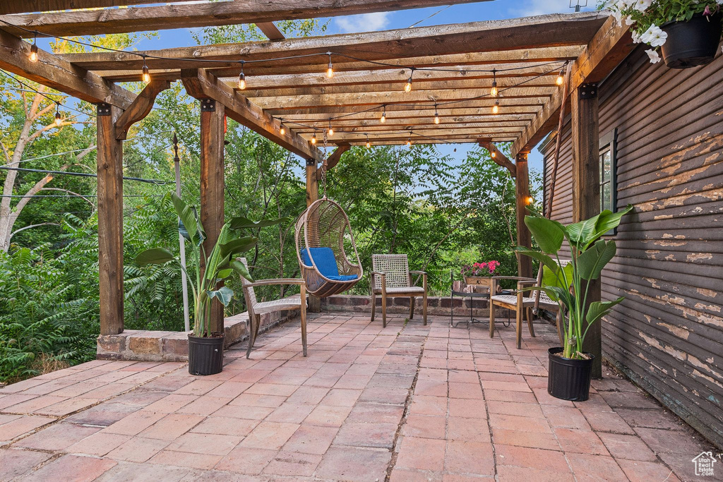 View of patio featuring a pergola