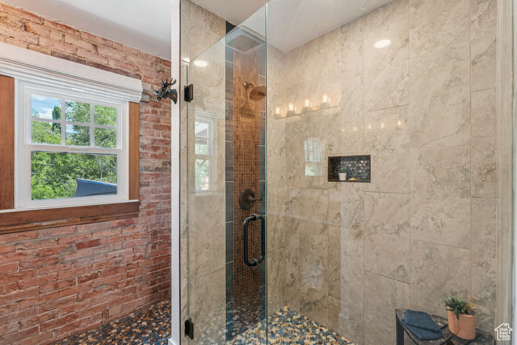Full bath featuring a stall shower