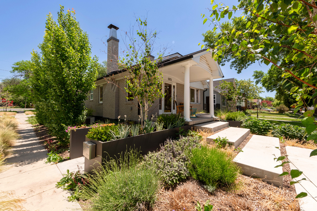 View of front of home with a chimney