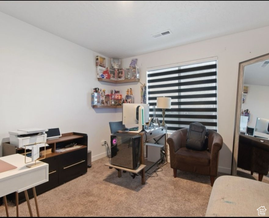 Office featuring carpet flooring and baseboards