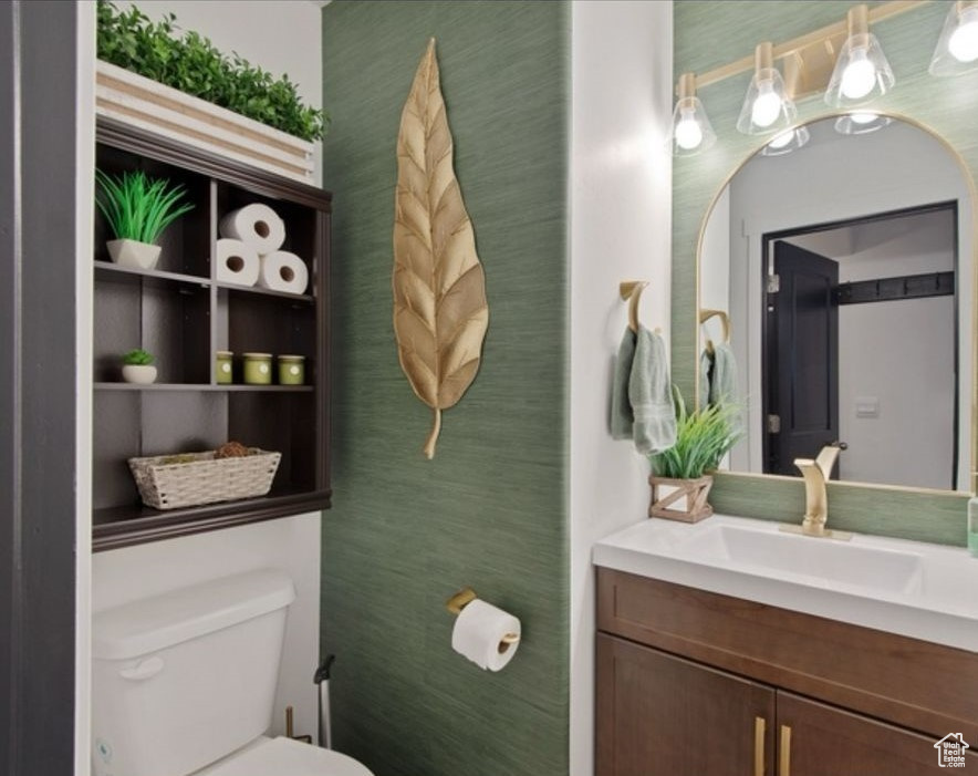 Bathroom with toilet and vanity