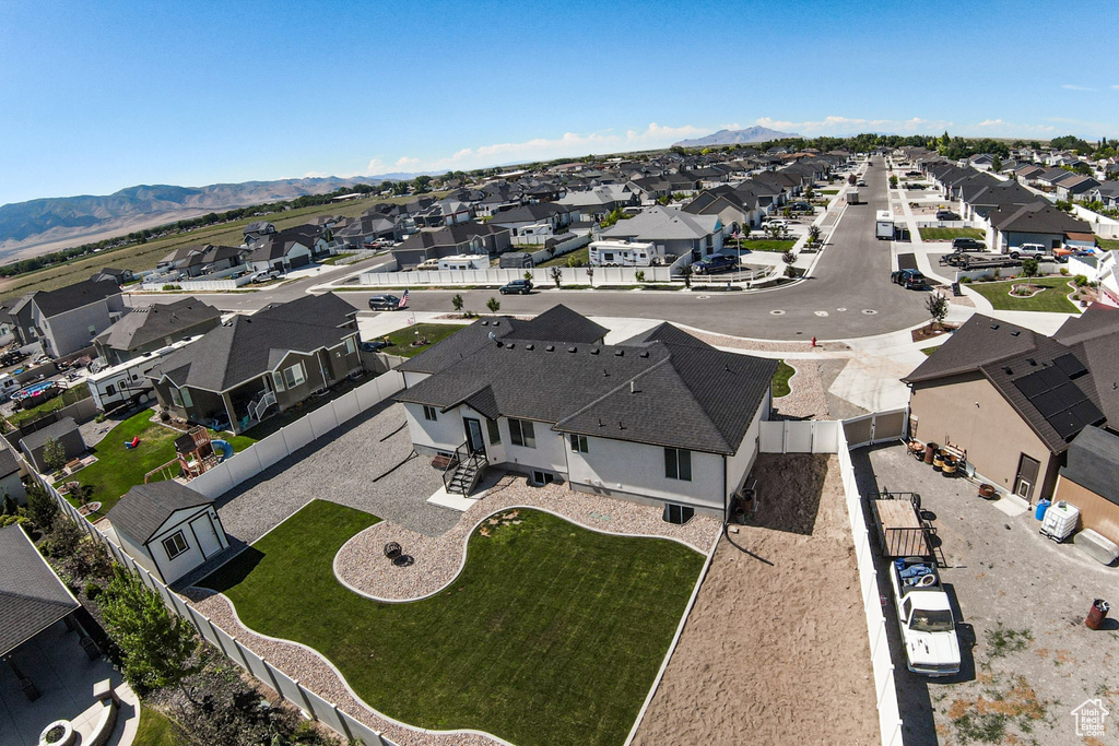 Aerial view of residential area with mountains
