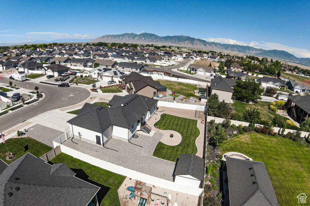 Aerial view of residential area with mountains