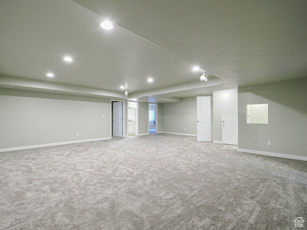 Basement with recessed lighting and carpet flooring