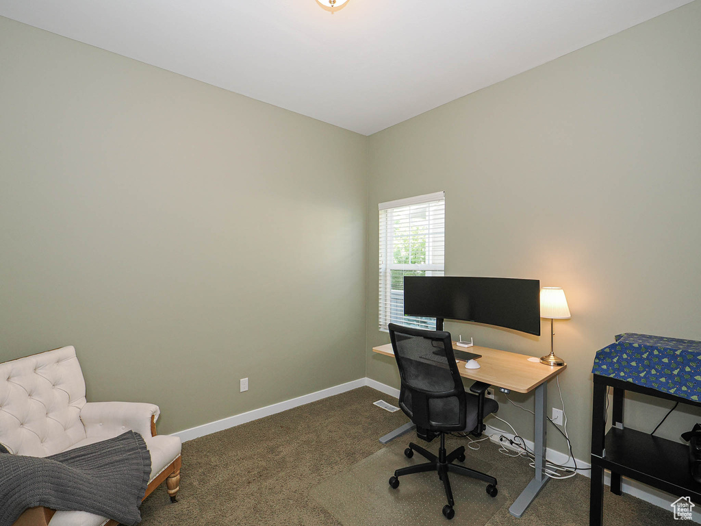 Office area with carpet floors and baseboards