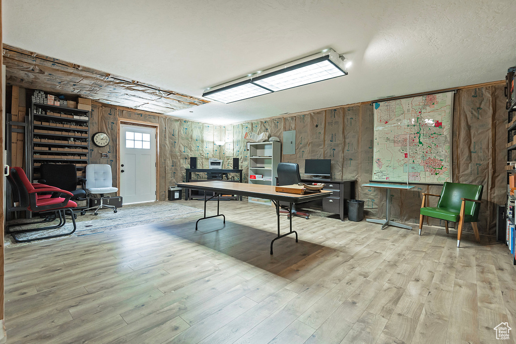 Office area featuring wood finished floors