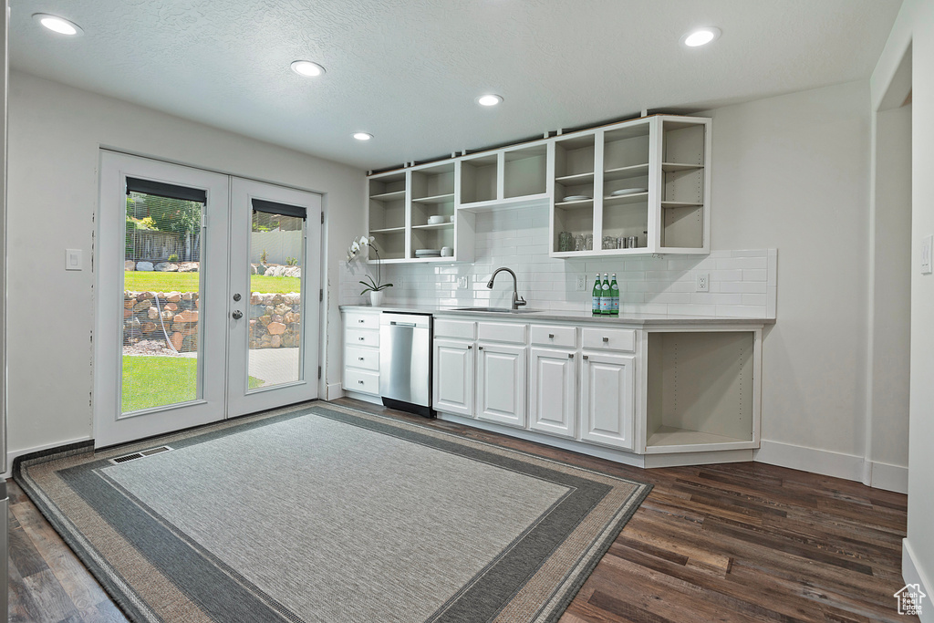 Kitchen with open shelves, dishwasher, french doors, tasteful backsplash, and recessed lighting