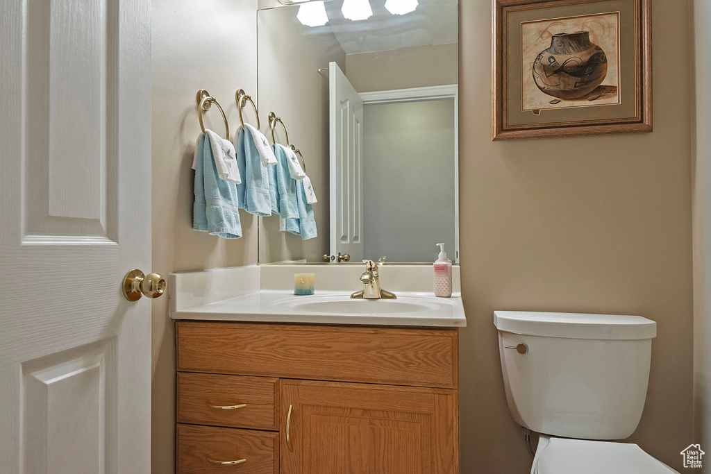 Bathroom with toilet and vanity