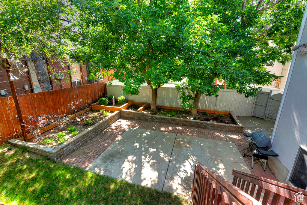 Fenced backyard featuring a patio area