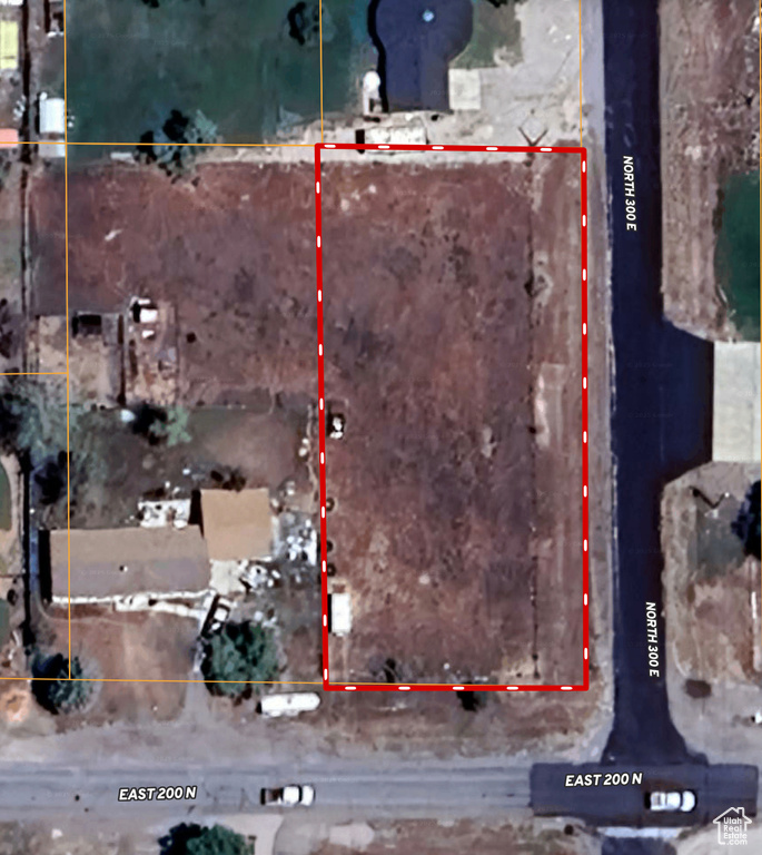 Aerial overview of property's location with property parcel outlined