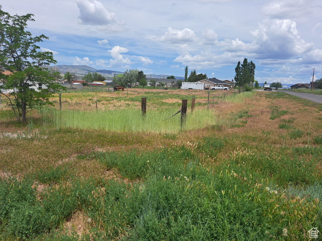 View of yard with a mountain view