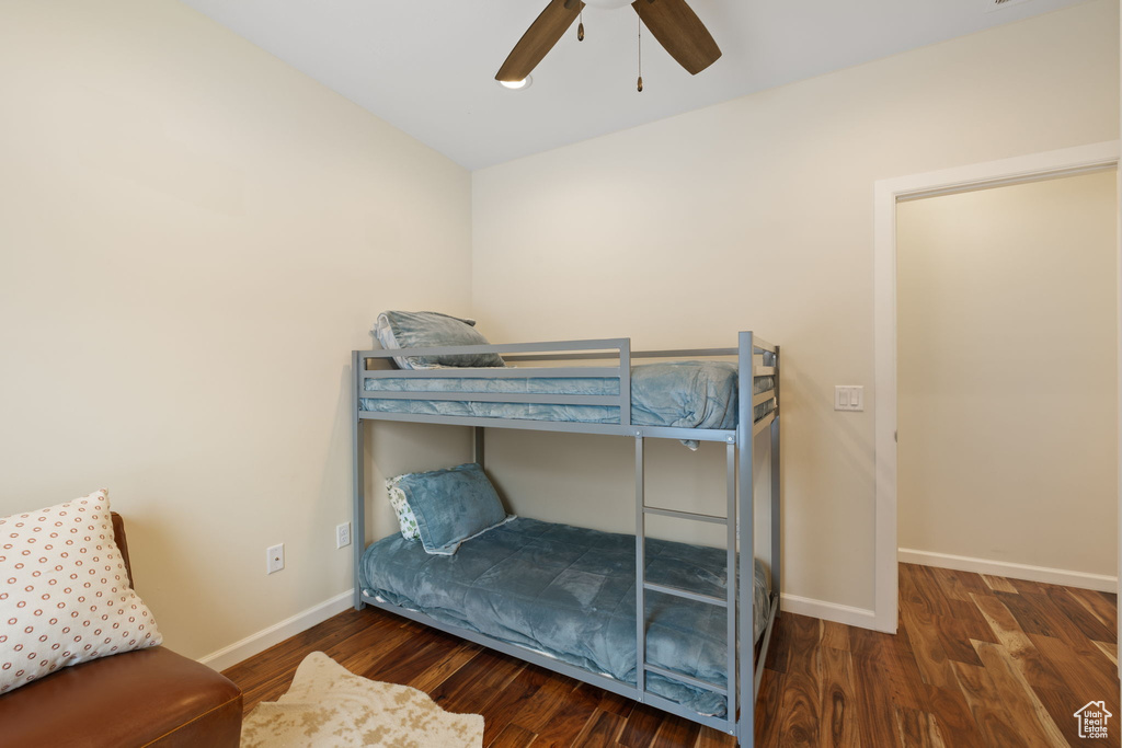 Bedroom with wood finished floors and ceiling fan