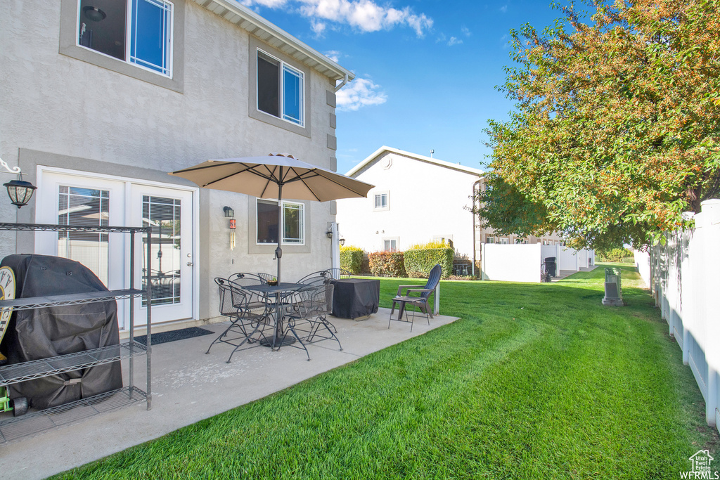 View of yard with a patio