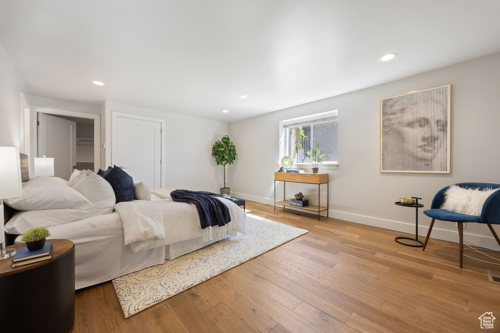 Bedroom featuring recessed lighting and wood finished floors