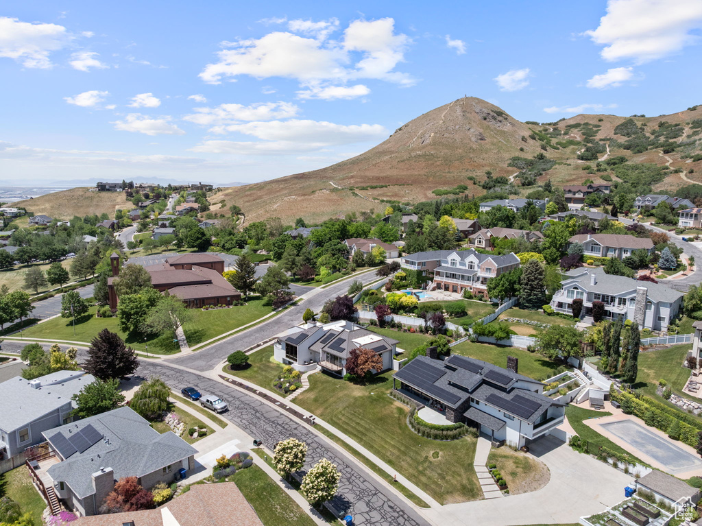 Aerial view of residential area with mountains