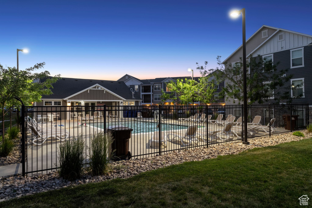 Community pool with a patio