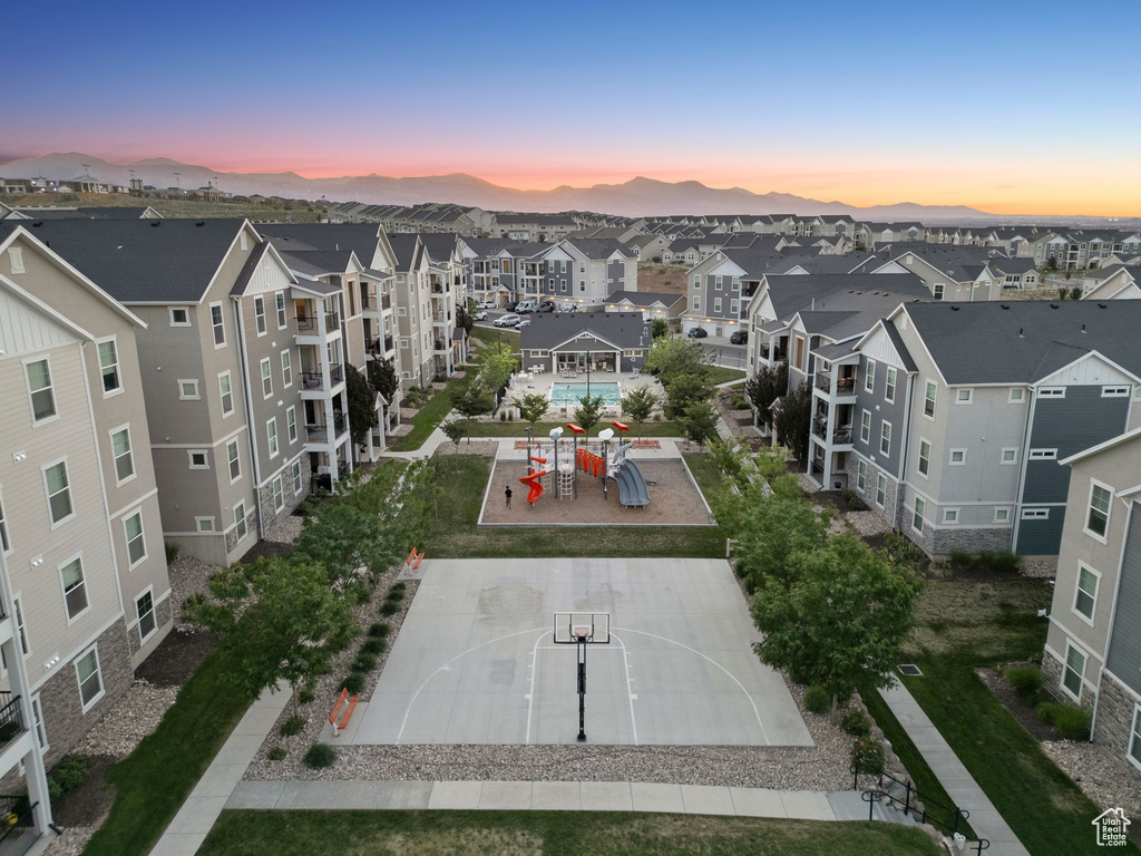 Aerial view at dusk of a residential view and a mountain view