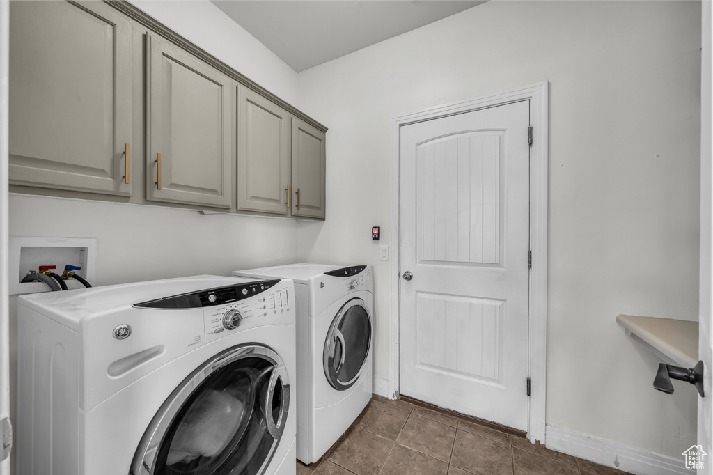 Laundry area with cabinet space and washer and dryer