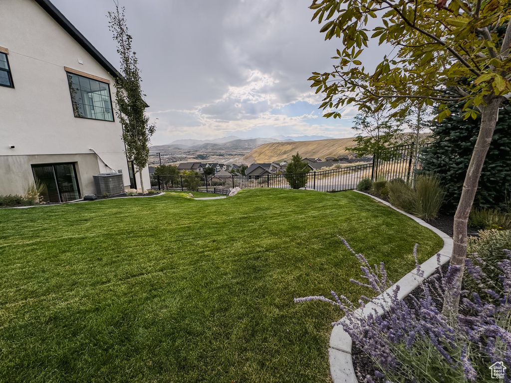 View of yard with a mountain view