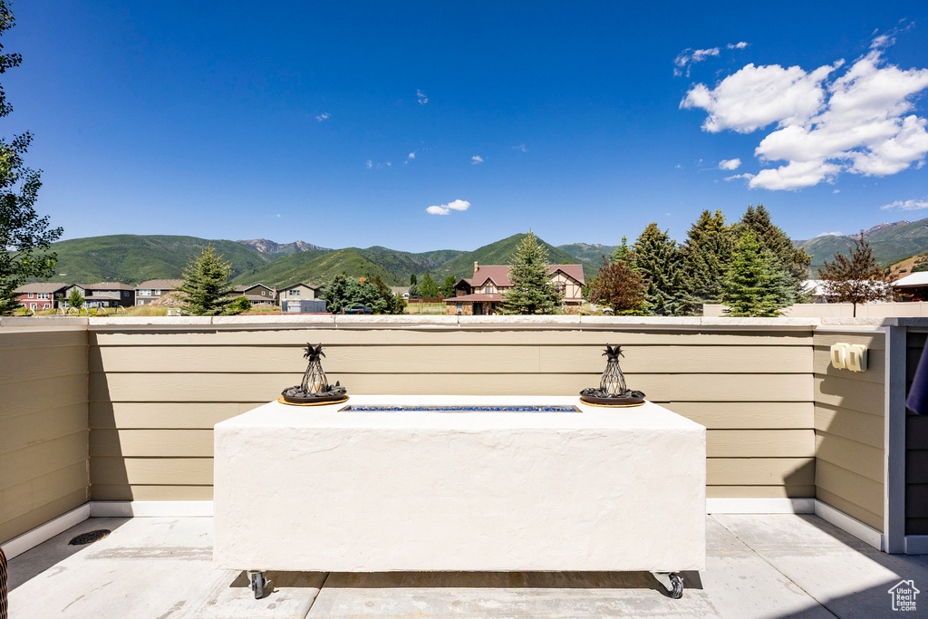 View of patio / terrace featuring a mountain view