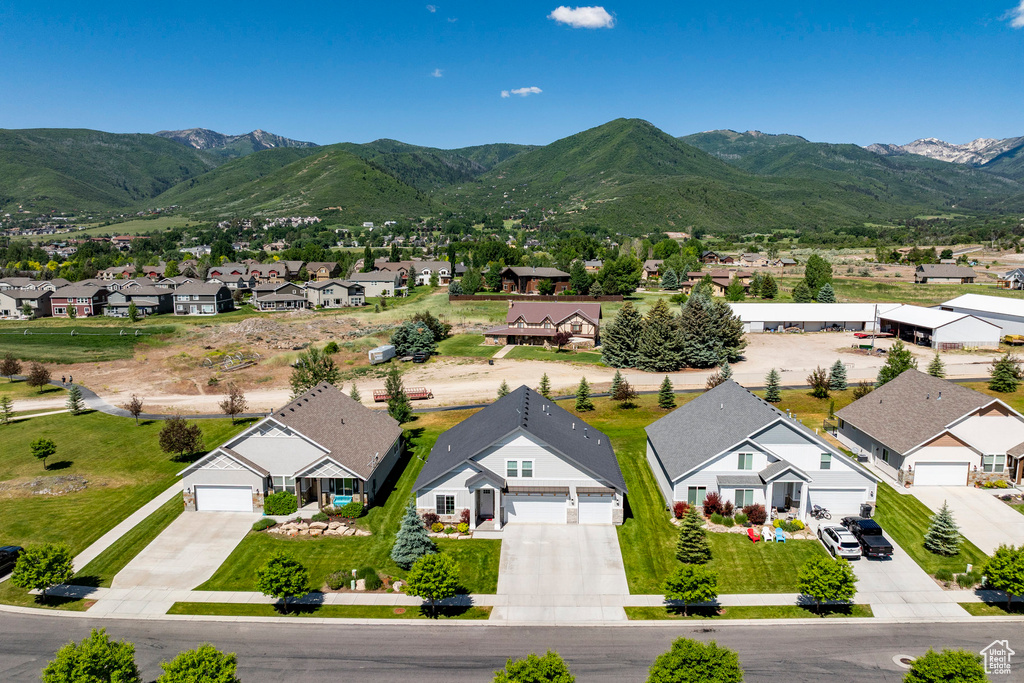 Aerial view of residential area with mountains