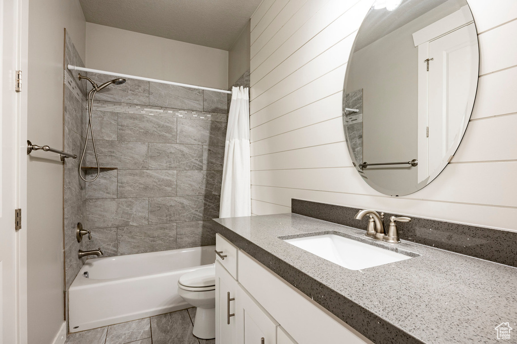Full bathroom with vanity and shower / bath combo